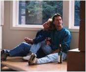 Buying or Building Your New Home - HBA of Southeastern Michigan - Couple-on-Floor-in-New-Home